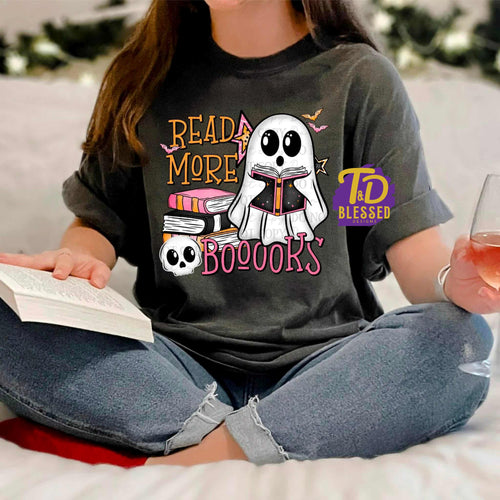 Read More Booooks Halloween ghost t-shirt featuring a cute ghost reading books – cozy fall shirt for book lovers and spooky season vibes.